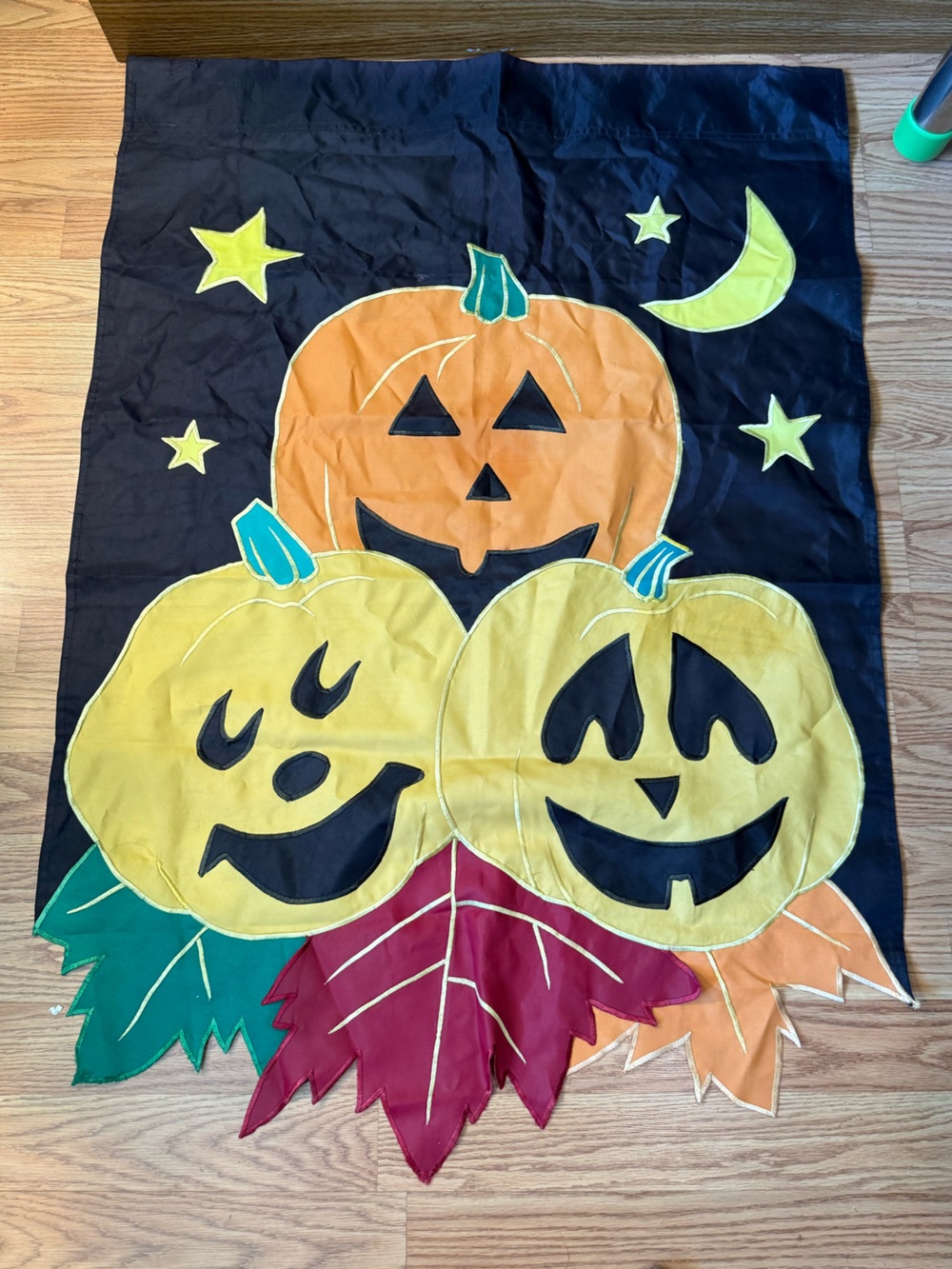 Outdoor fabric Pumpkin Fall Holiday Decor Flag featuring jack-o'-lanterns